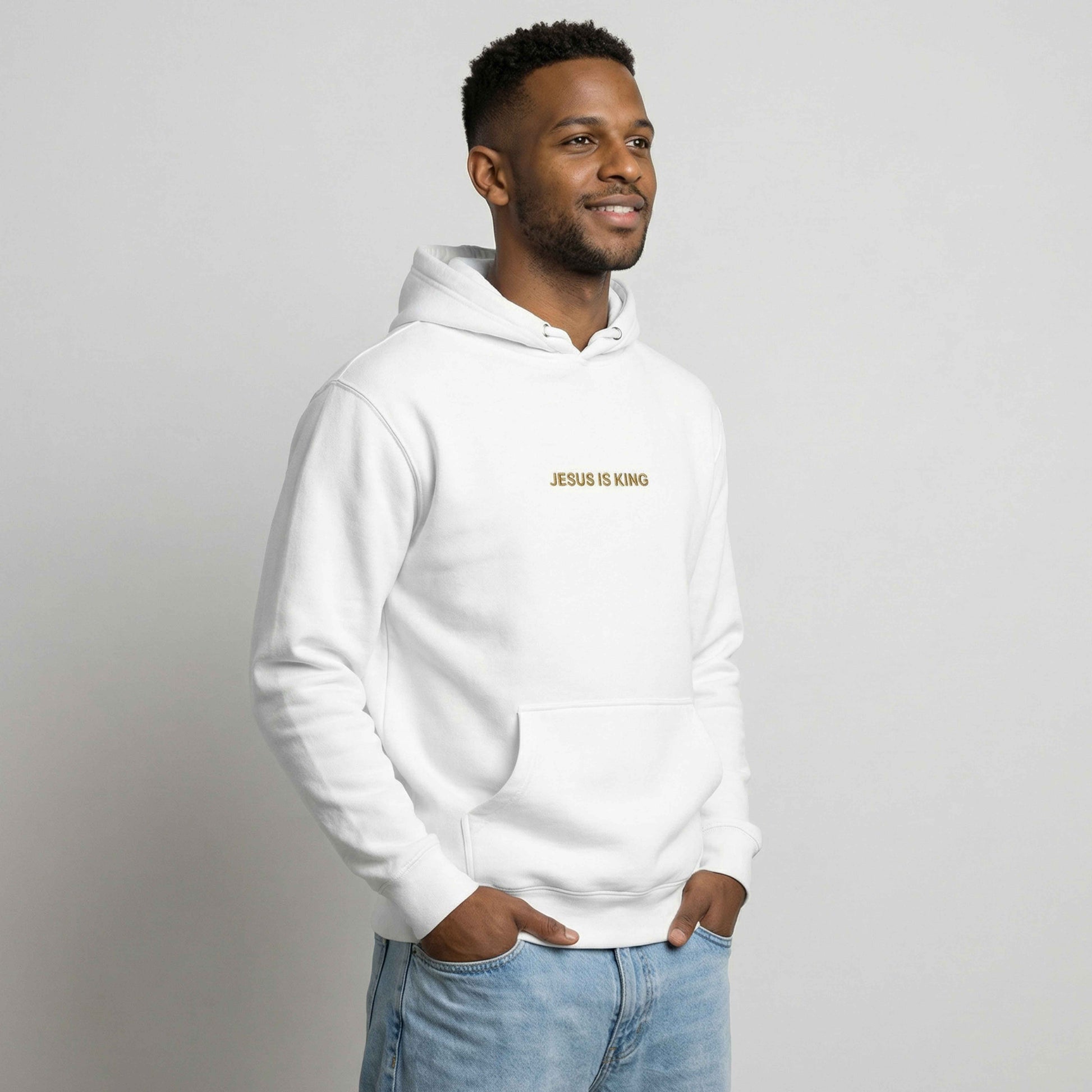 man wearing Jesus is King Hoodie - right